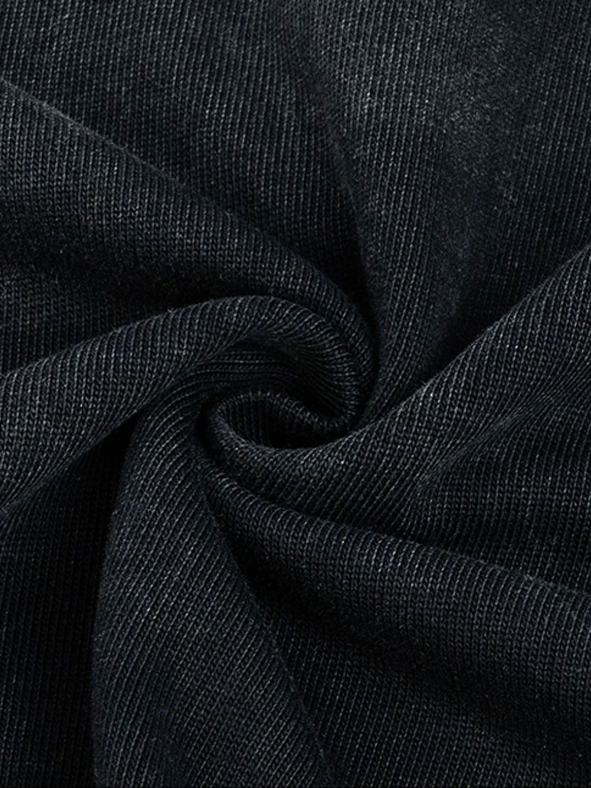 Washed black polo shirt – fabric texture close-up | XoKool