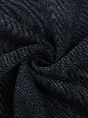Washed black polo shirt – fabric texture close-up | XoKool