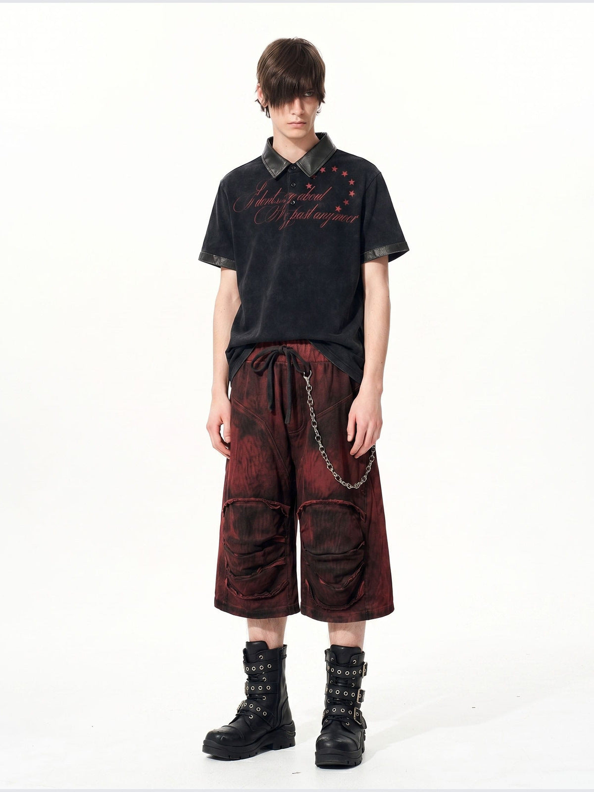 Washed black polo shirt – on model, front | XoKool
