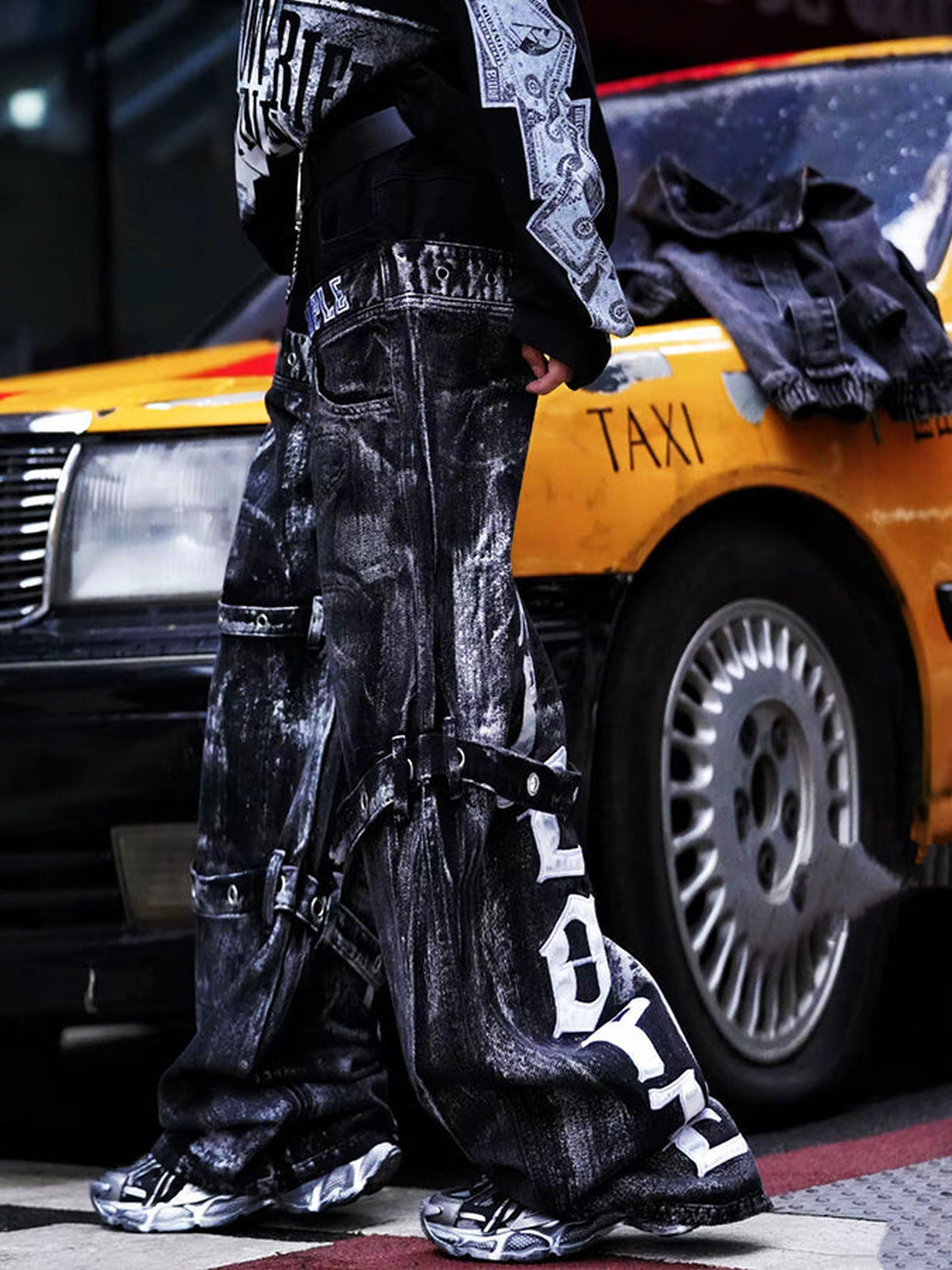 Washed Black Strap Jeans with Gothic Letter Print – on model, side | XoKool