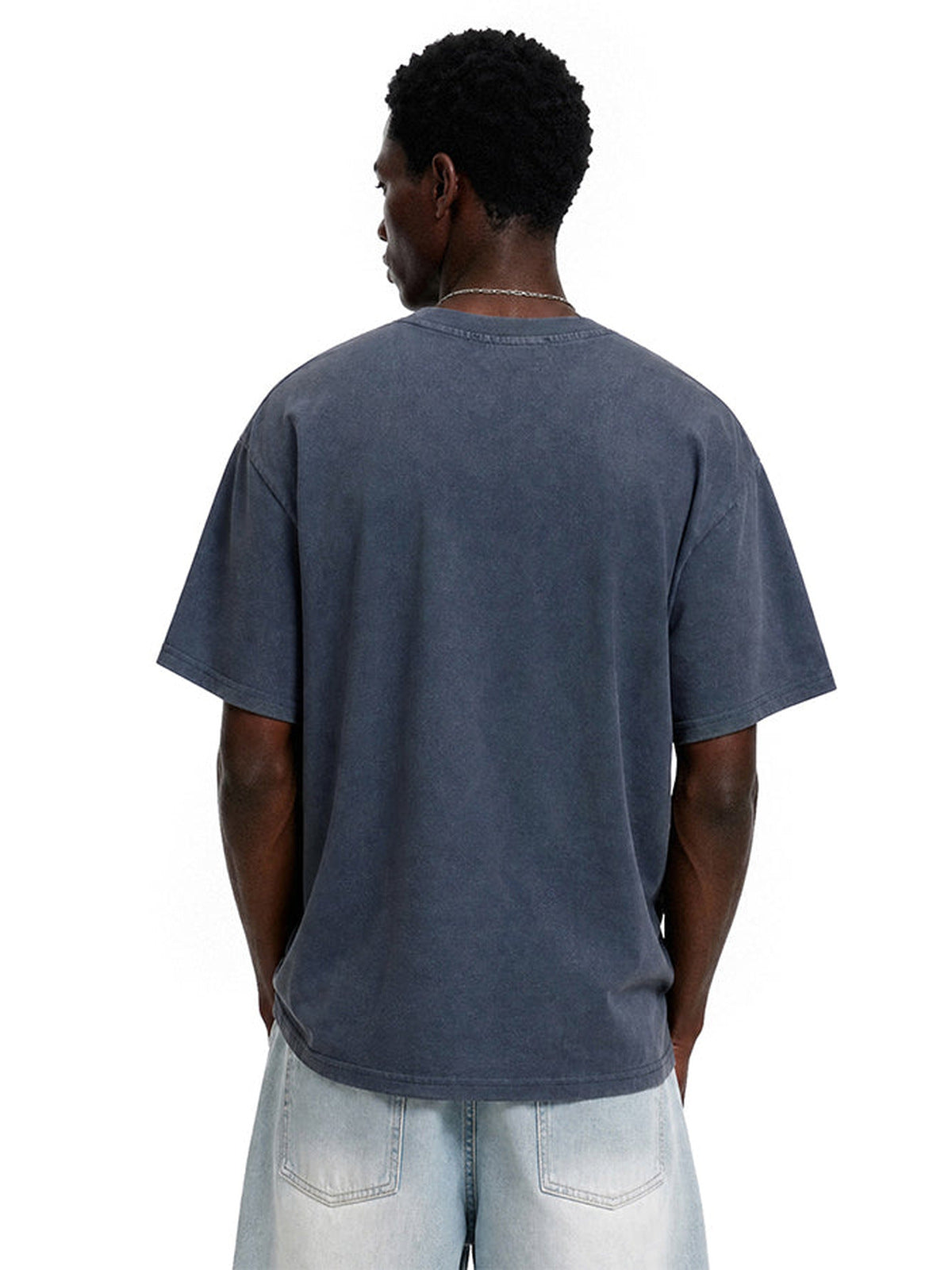 Washed cross tee – on model, blue back | XoKool