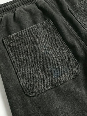 Pantalones deportivos con cremallera en el bajo – primer plano del bolsillo trasero | XoKool