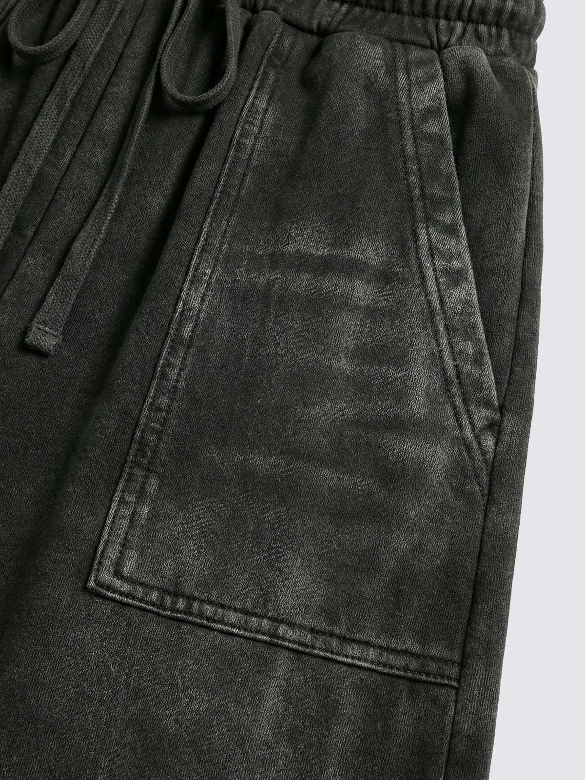 Pantalones deportivos con cremallera en el bajo – primer plano del bolsillo delantero | XoKool