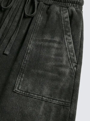Pantalones deportivos con cremallera en el bajo – primer plano del bolsillo delantero | XoKool