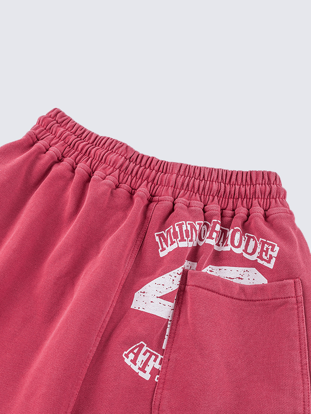 Sweat Shorts – Washed Red, back graphic and pocket close-up | XoKool