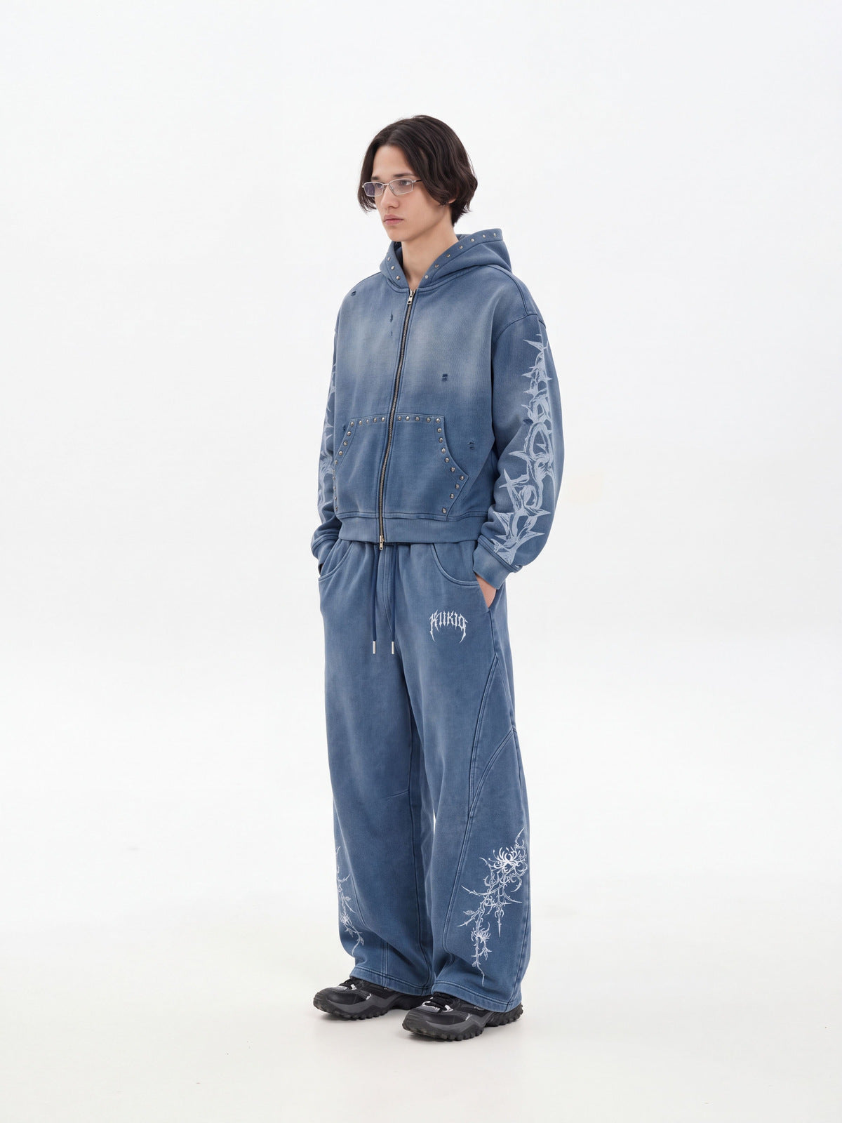 Thorn zip up hoodie – Blue, on model full outfit, side | XoKool