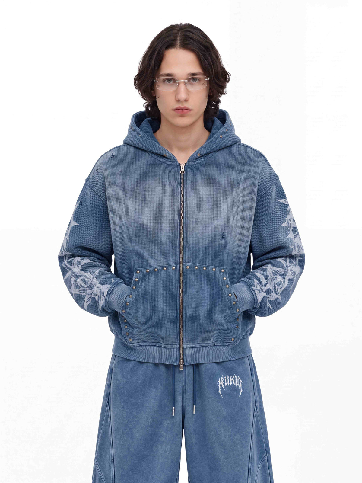 Washed Thorn Print Studded Zip Up Hoodie – Blue, on model with matching pants, front | XoKool