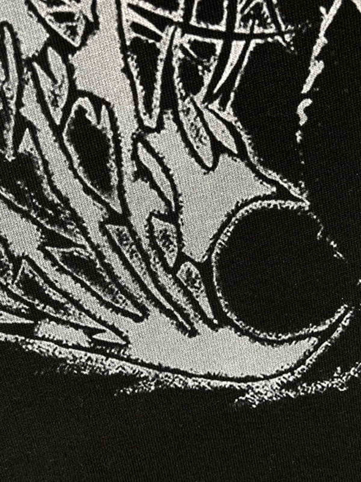 Winged skeleton layered tee – wing graphic close-up | XoKool