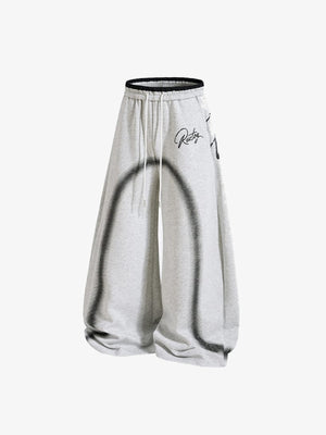 Y2K Barrel Sweatpants with Airbrush Arch Print – Grey, angled view | XoKool