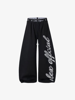 Y2K Jogginghose mit Schriftzug-Print und Layered-Bund – Schwarz, Vorderseite flach | XoKool