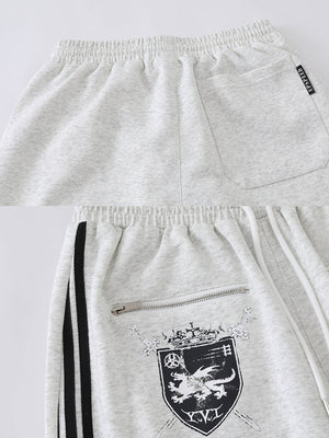 Jogginghose mit Zip-Taschen – Etikett an der Gesäßtasche und Zip-Tasche im Detail | XoKool