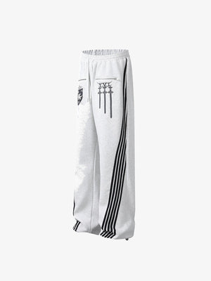 Jogginghose mit Zip-Taschen und Seitenstreifen – Grau meliert, Seitenansicht | XoKool