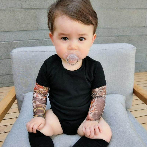 It’s not every day you see a baby sporting some awesome tats! Dress your cool kid in this unisex romper and it will be sure to turn heads! It comes with printed tattoos on each sleeve 👶 We use sublimation printing for optimal color rendering You won't be