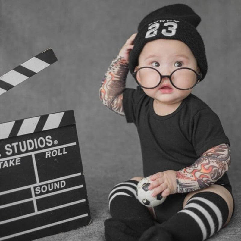 It’s not every day you see a baby sporting some awesome tats! Dress your cool kid in this unisex romper and it will be sure to turn heads! It comes with printed tattoos on each sleeve 👶 We use sublimation printing for optimal color rendering You won't be