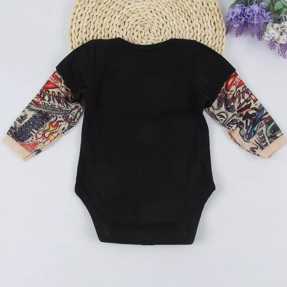 It’s not every day you see a baby sporting some awesome tats! Dress your cool kid in this unisex romper and it will be sure to turn heads! It comes with printed tattoos on each sleeve 👶 We use sublimation printing for optimal color rendering You won't be