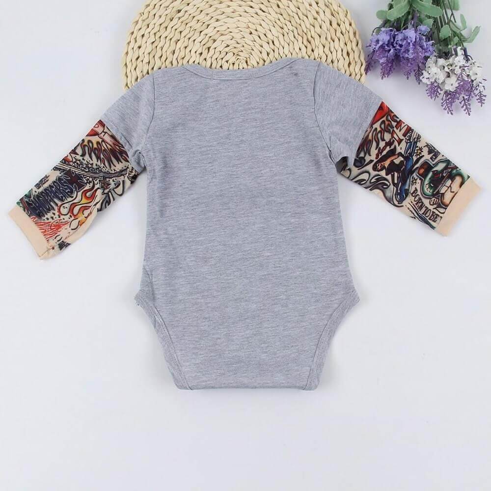 It’s not every day you see a baby sporting some awesome tats! Dress your cool kid in this unisex romper and it will be sure to turn heads! It comes with printed tattoos on each sleeve 👶 We use sublimation printing for optimal color rendering You won't be